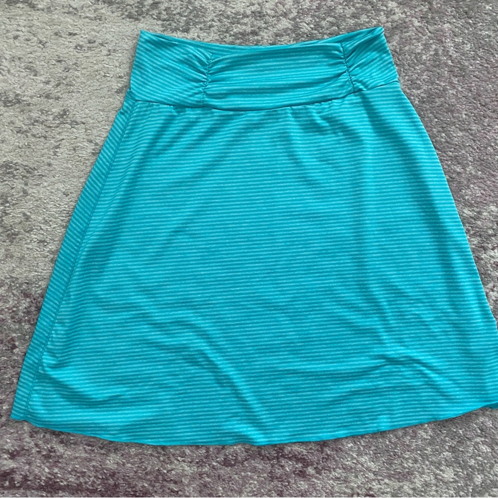 Turquoise summery skirt.